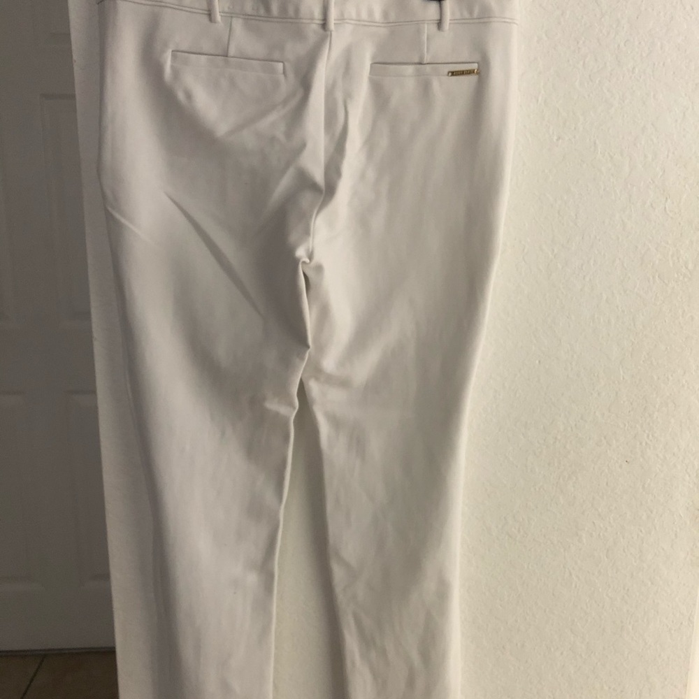 White trousers.